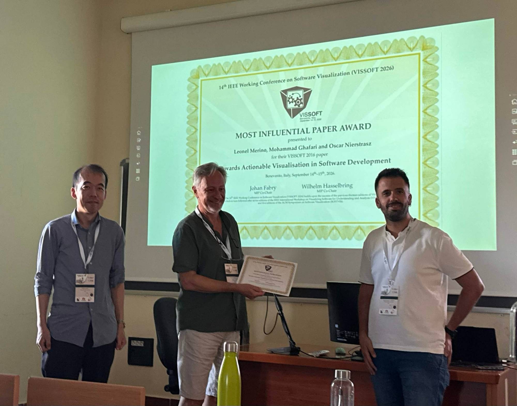 MIP award ceremony at VISSOFT 2026: from left to right, Takashi Ishio, Oscar Nierstrasz, and David Moreno